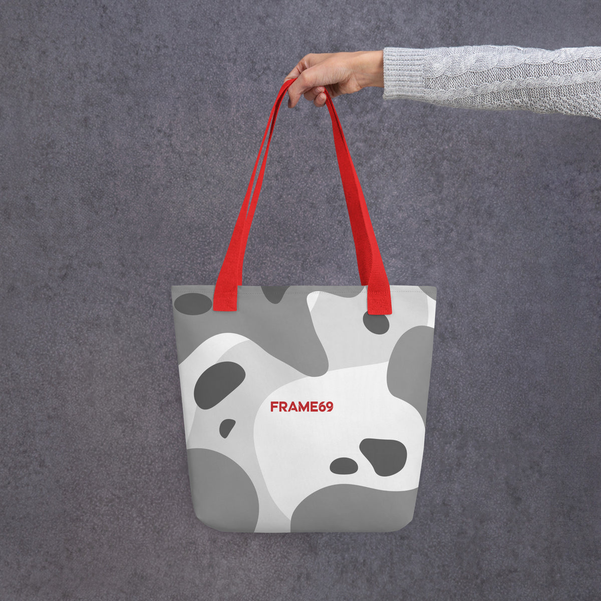 White tote bag with red handles and abstract cow print, FRAME69.