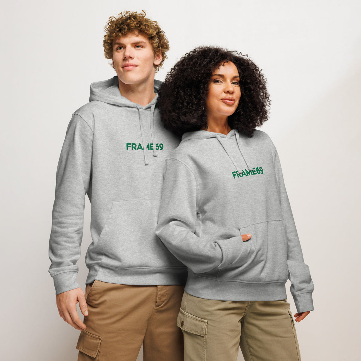 Light heather gray pullover hoodie with hood and kangaroo pocket, logo on chest