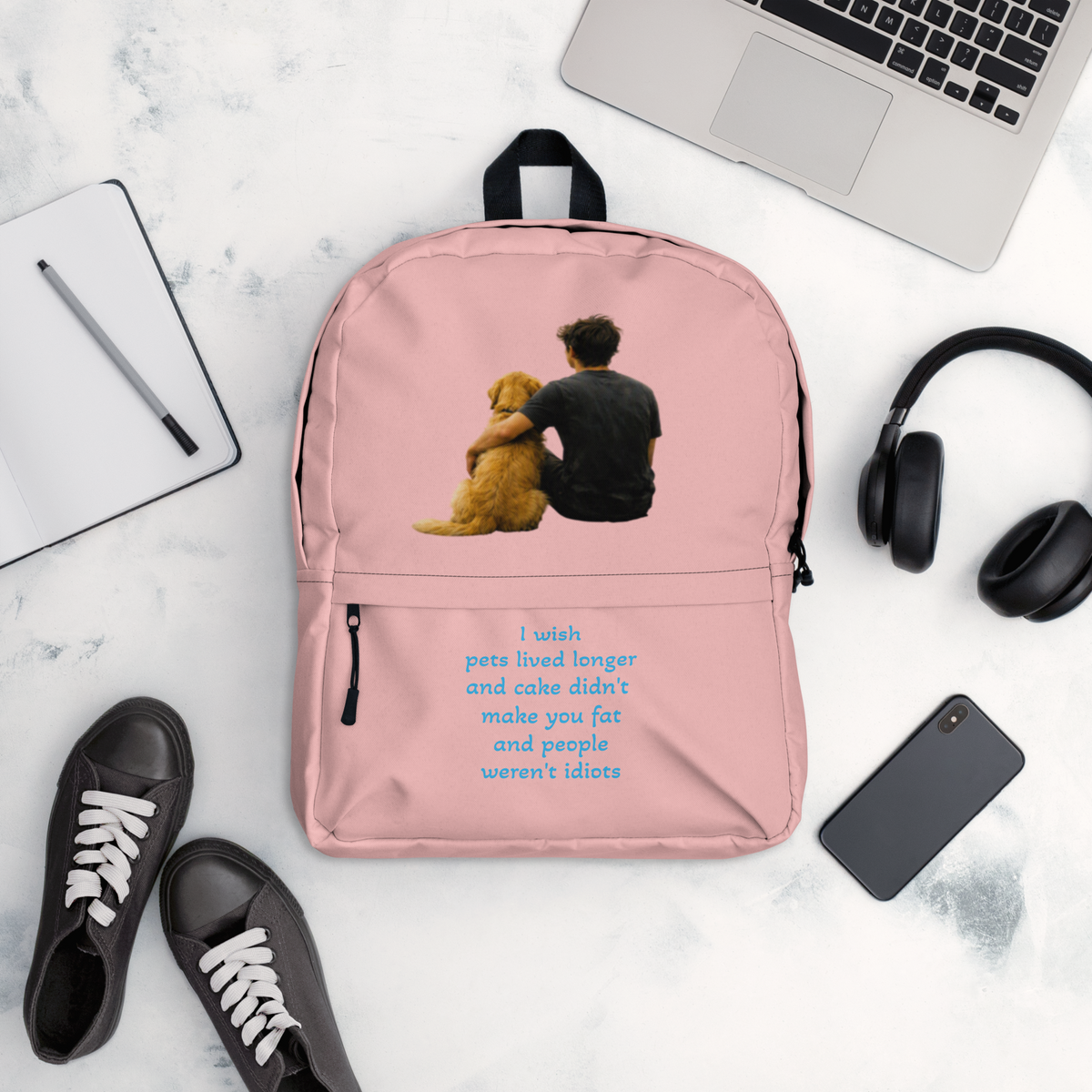 Pink everyday backpack with teddy bear front graphic, blue text, and dual side zippers