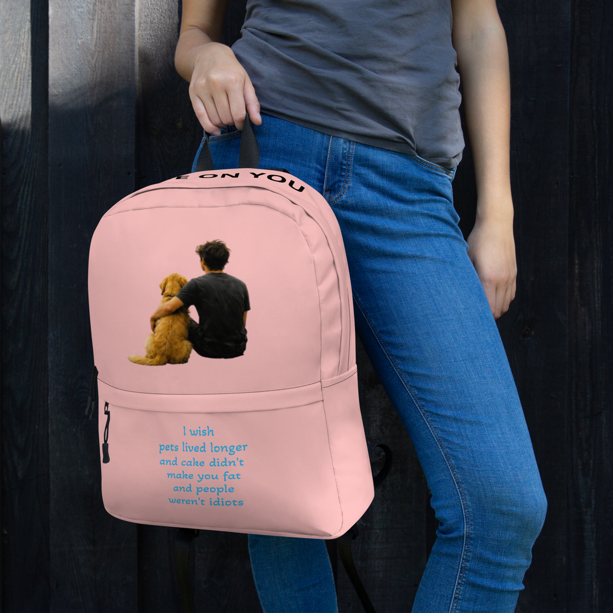 Pink everyday backpack with front pocket and adjustable straps, teddy keychain detail