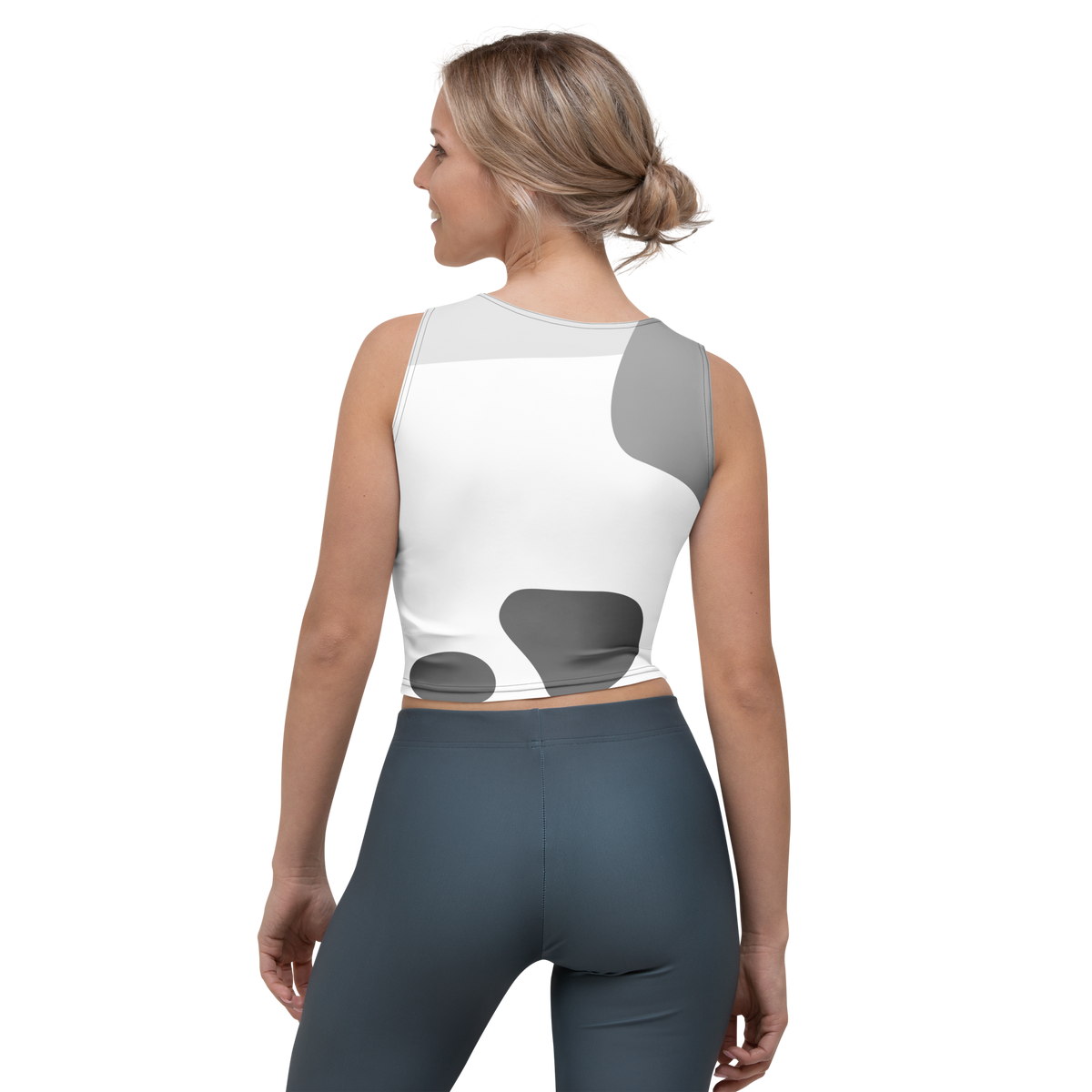 White stretch crop top, back view with gray abstract graphic, sleeveless