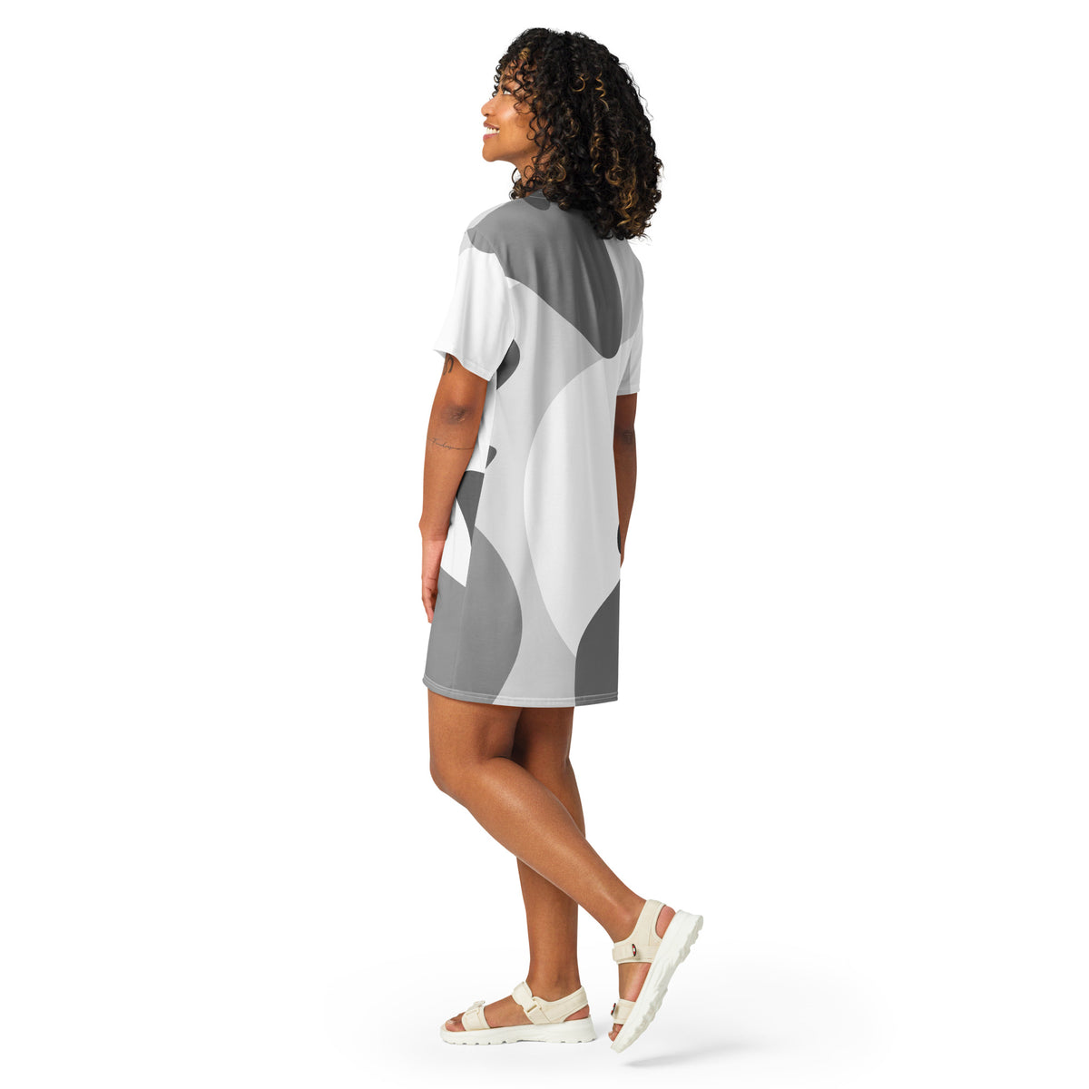 Abstract tee dress, back view, gray-and-white graphic, short sleeves, crew neck.