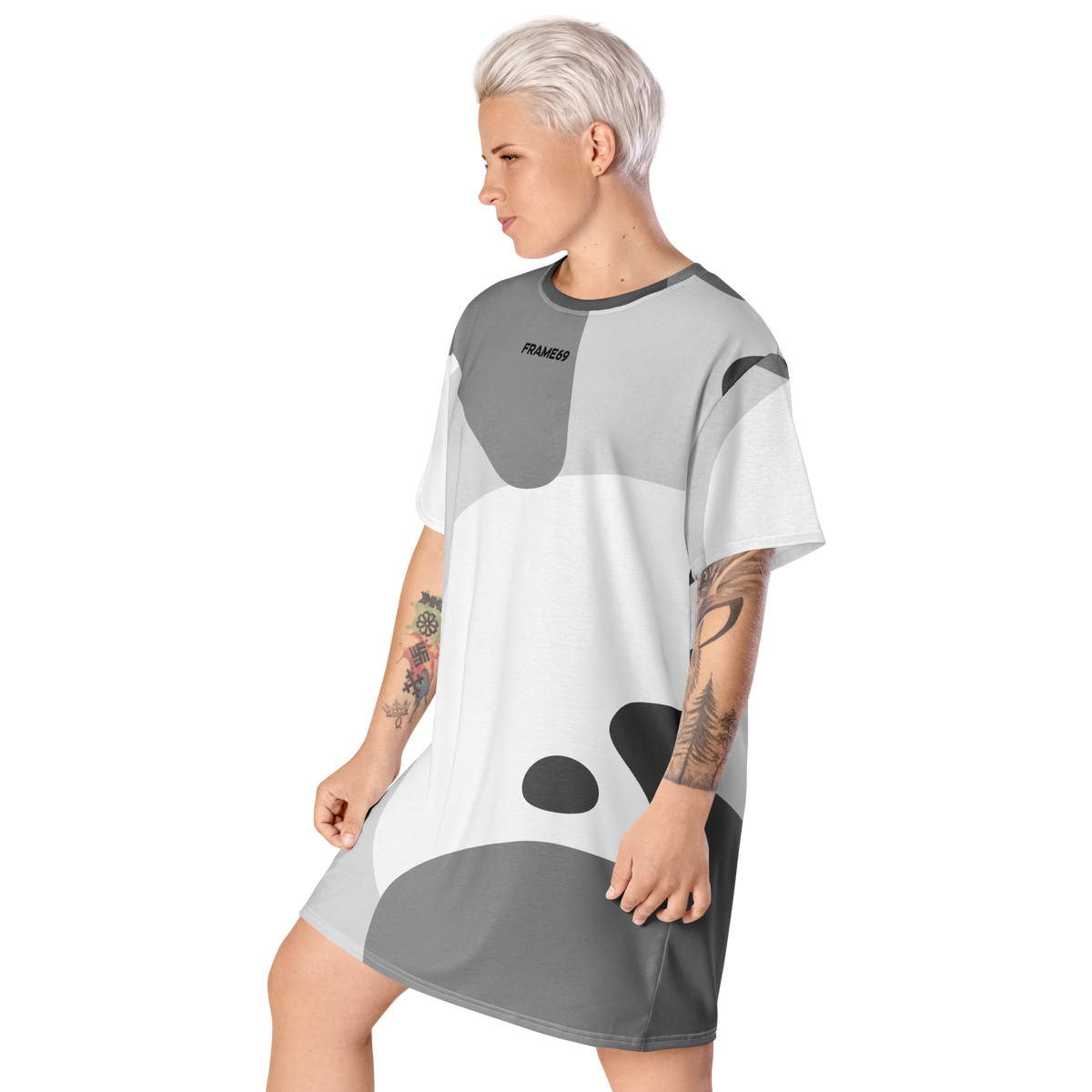 Abstract tee dress side view, gray-and-white abstract pattern, crew neck, short sleeves.