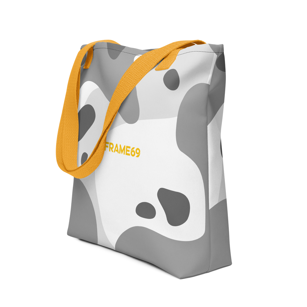 Graphic tote bag with yellow handles, abstract cow print on white, FRAME69.