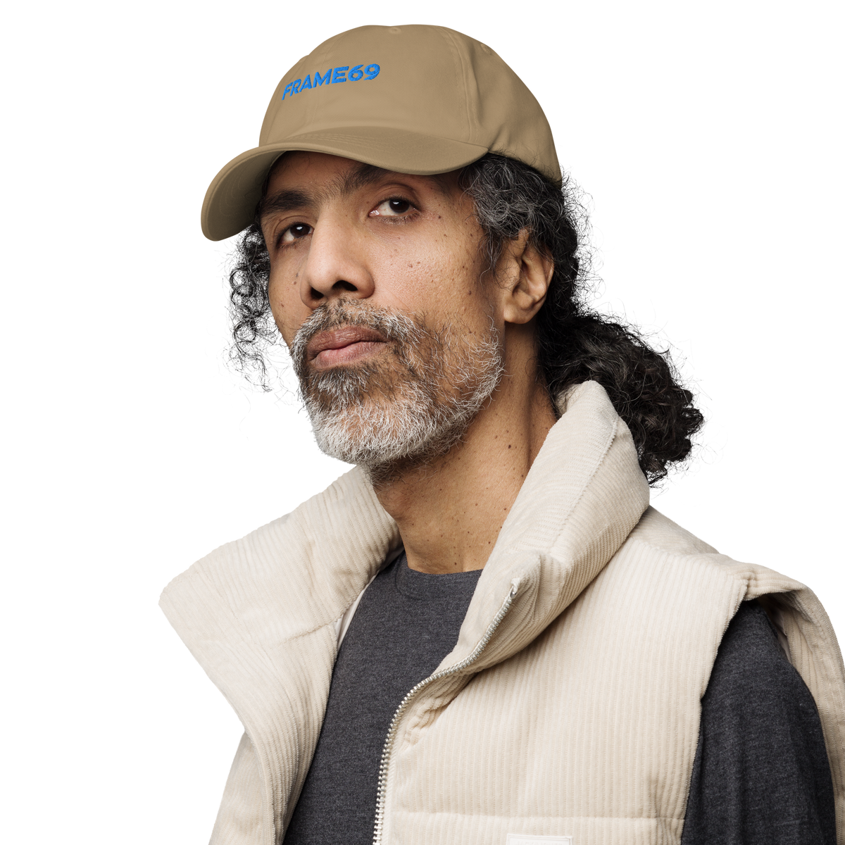 Khaki chino dad hat worn by model, FRAME69 logo on front