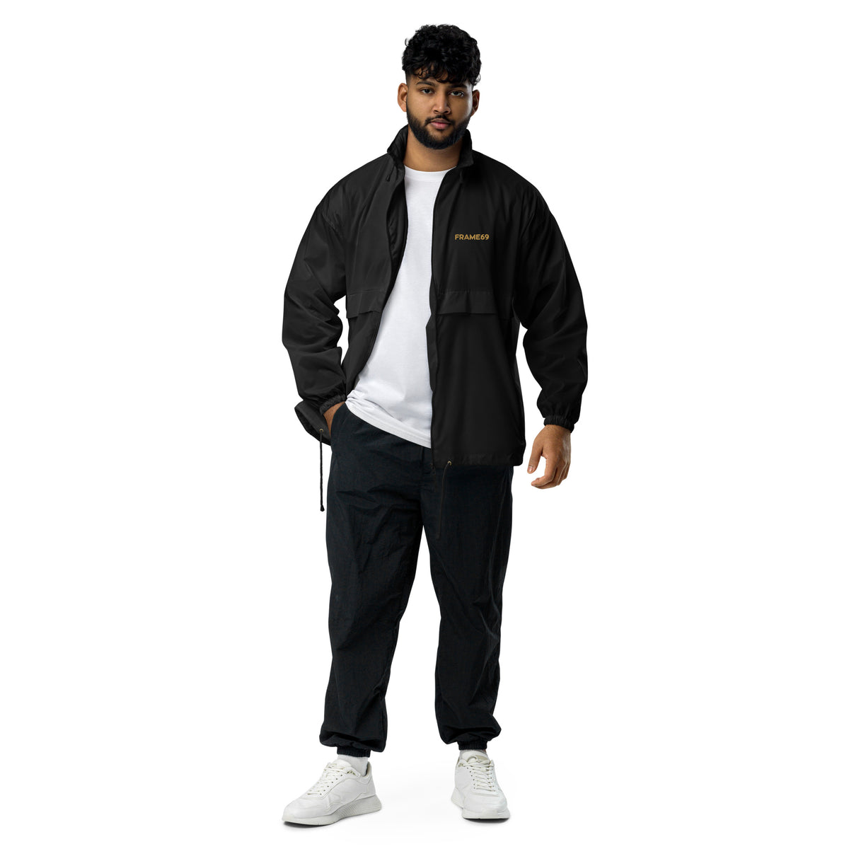 Black windbreaker jacket with hood, full-zip front, and FRAME69 logo worn open