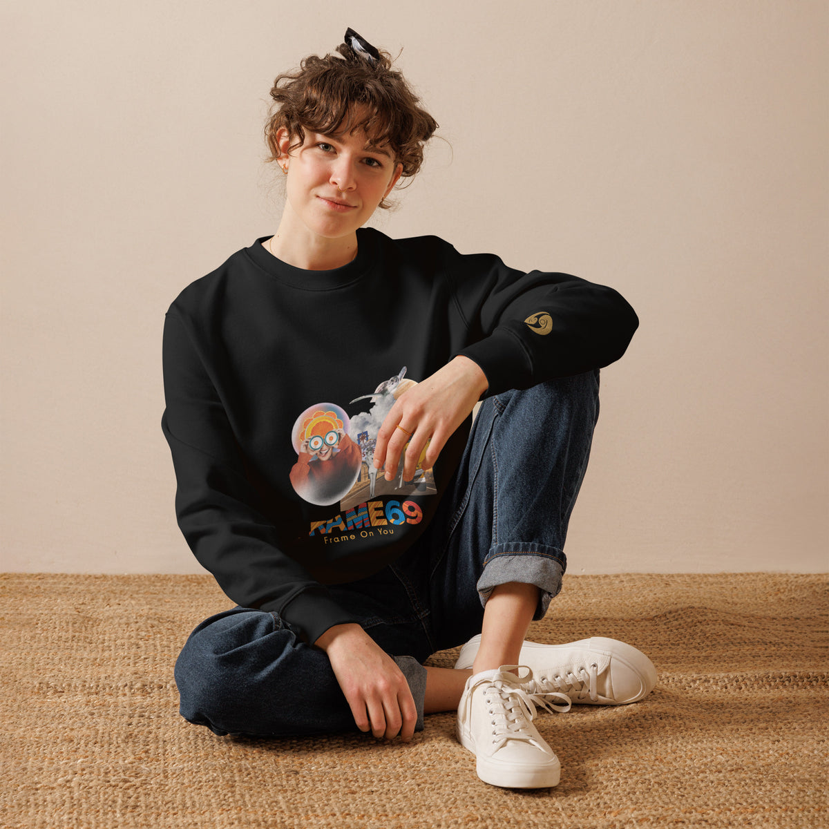 Crewneck sweatshirt on model, black long sleeves with front character graphic