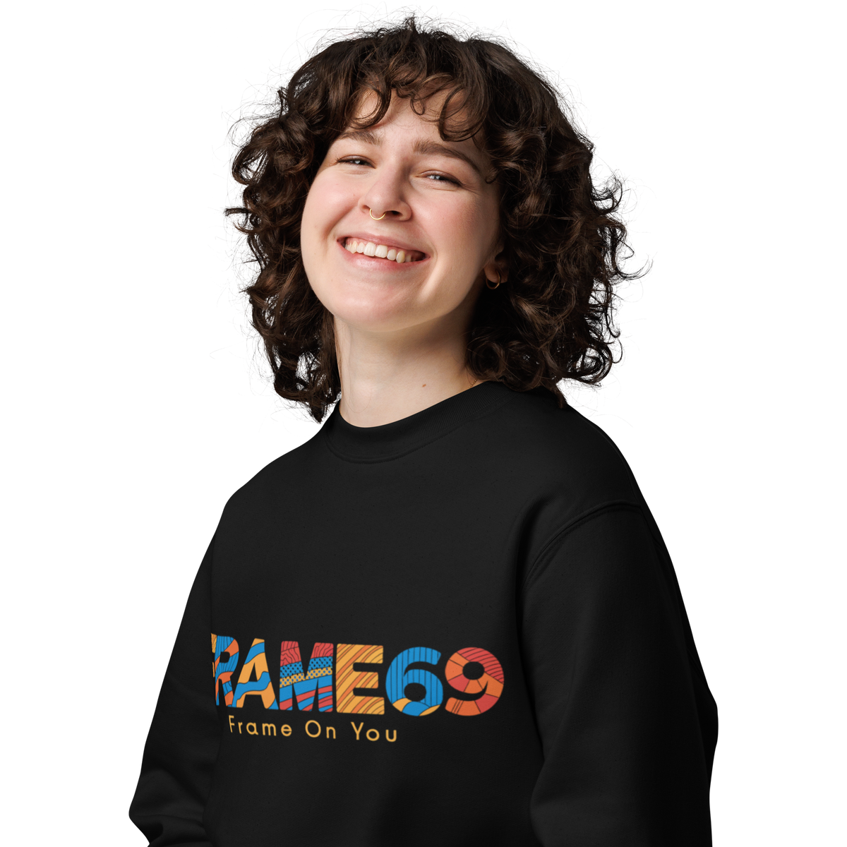 Black crewneck sweatshirt with “FRAME69” graphic and “Frame On You” text, close-up