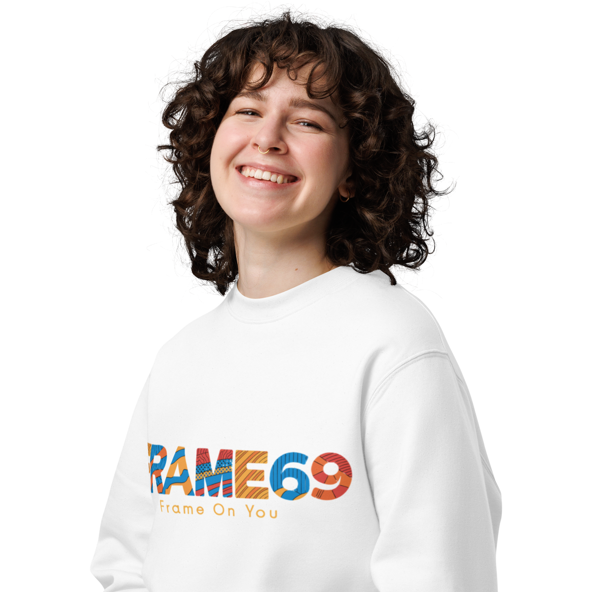 White crewneck sweatshirt with “FRAME69” graphic and “Frame On You” text, close-up