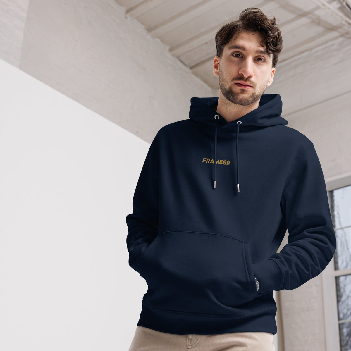 French navy hoodie close-up with hood and FRA ME69 chest text