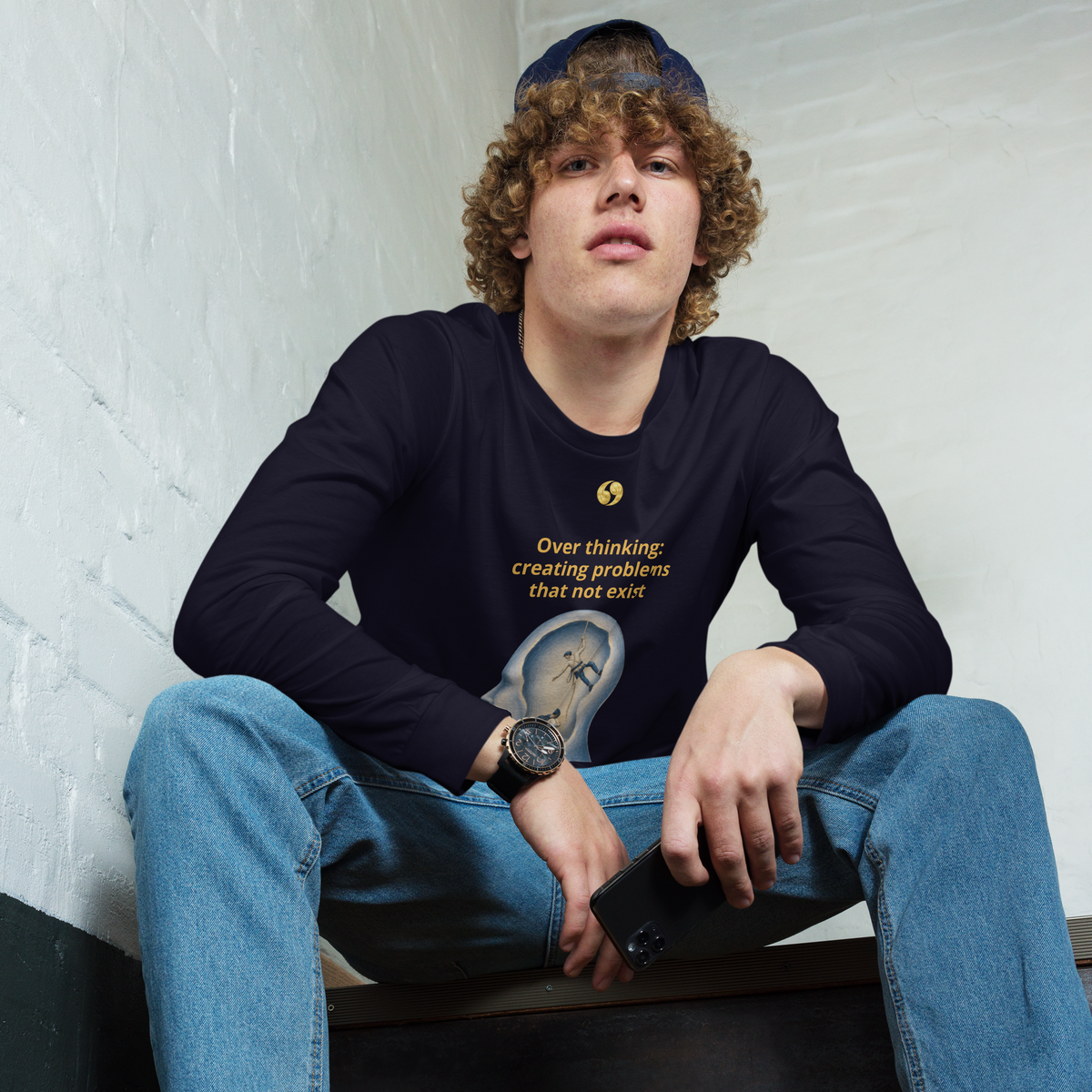 Navy long-sleeve tee close-up of front graphic and crew neck