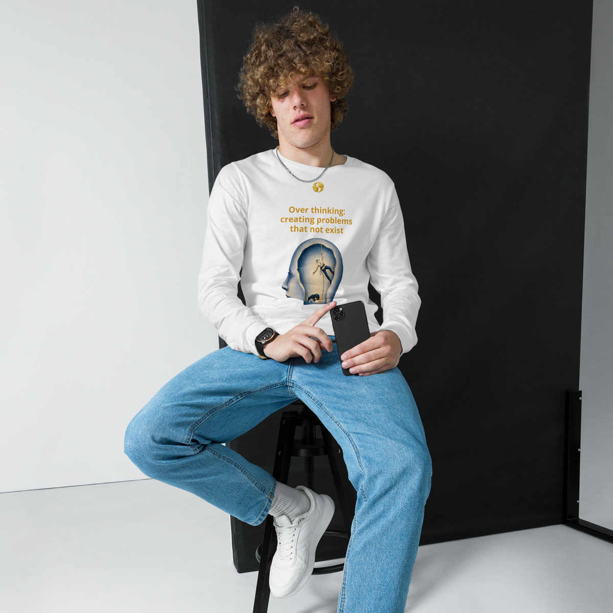 White long-sleeve tee with round neck and front graphic print