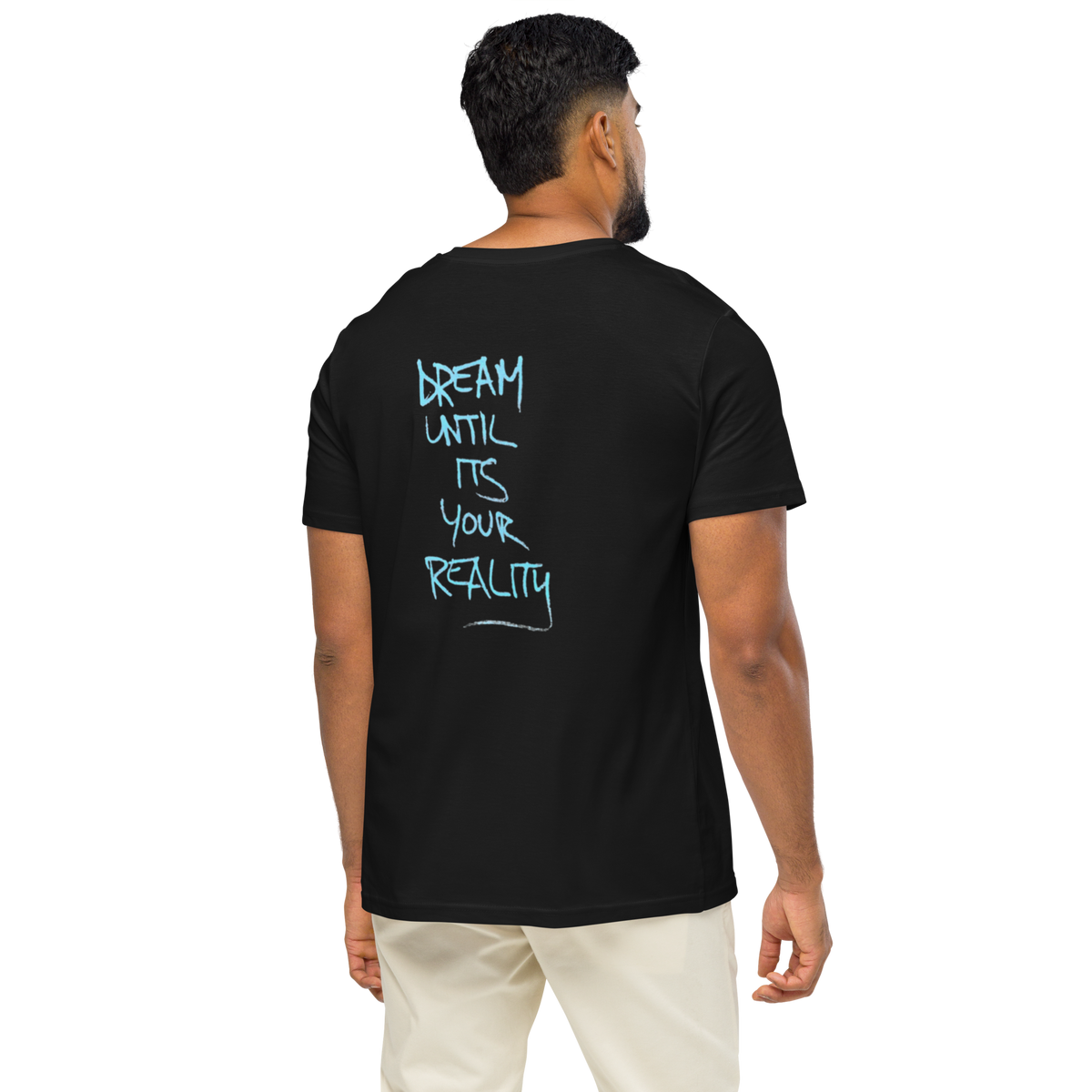 Black graphic tee, back print reads “DREAM UNTIL ITS YOUR REALITY” in light blue
