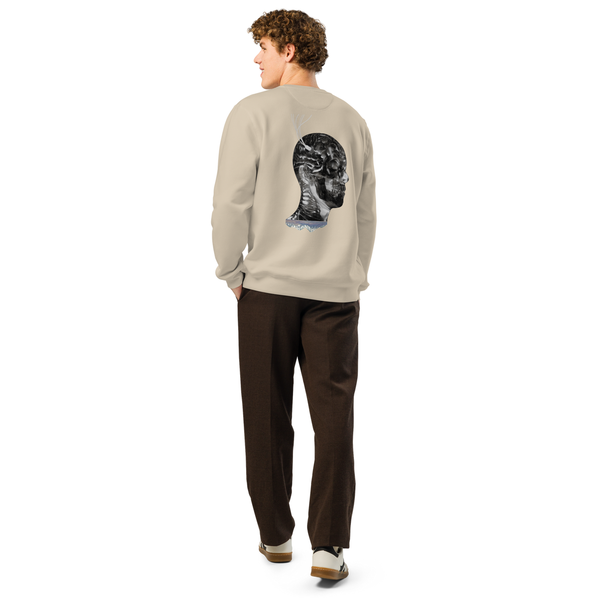 Sand-colored crewneck sweatshirt with black portrait graphic on the back