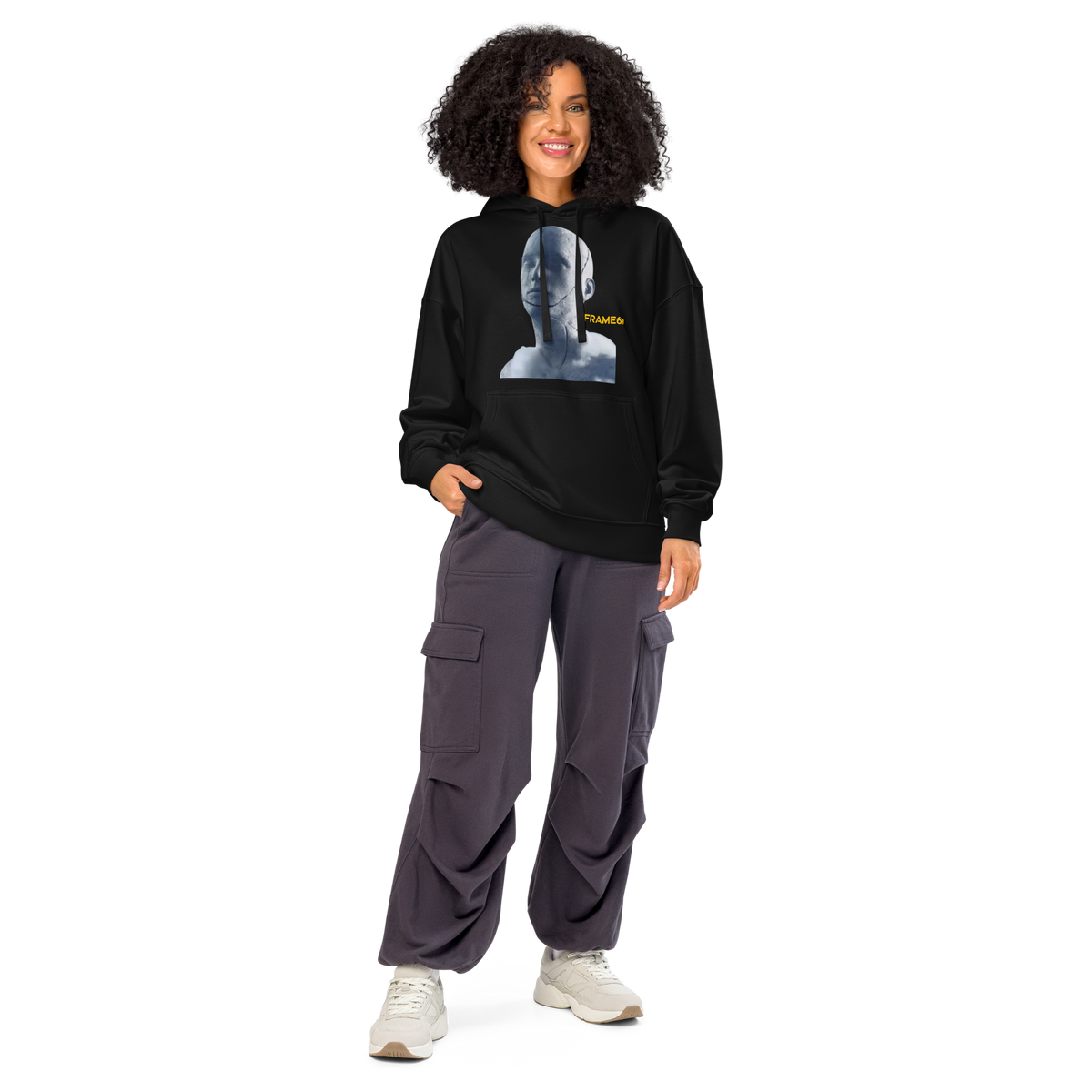 Black pullover hoodie with hood and front portrait graphic, relaxed fit