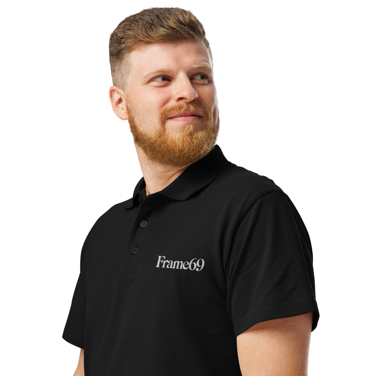 Black pique polo shirt close-up, button placket and Frame69 chest logo
