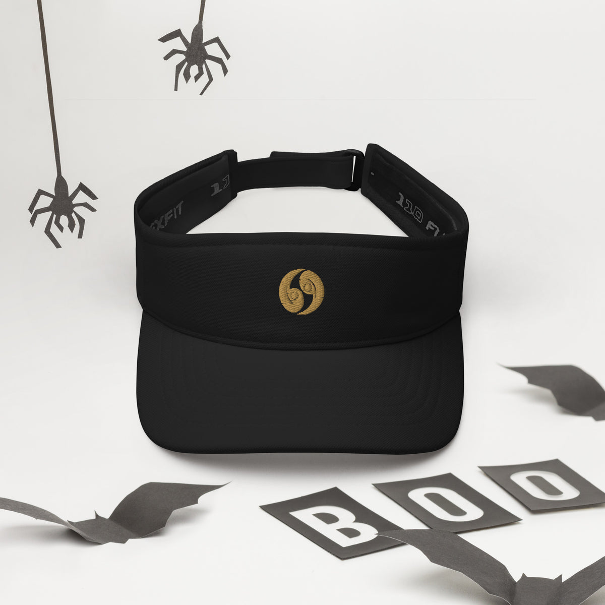 Black classic visor with curved brim and gold front logo, adjustable inner band