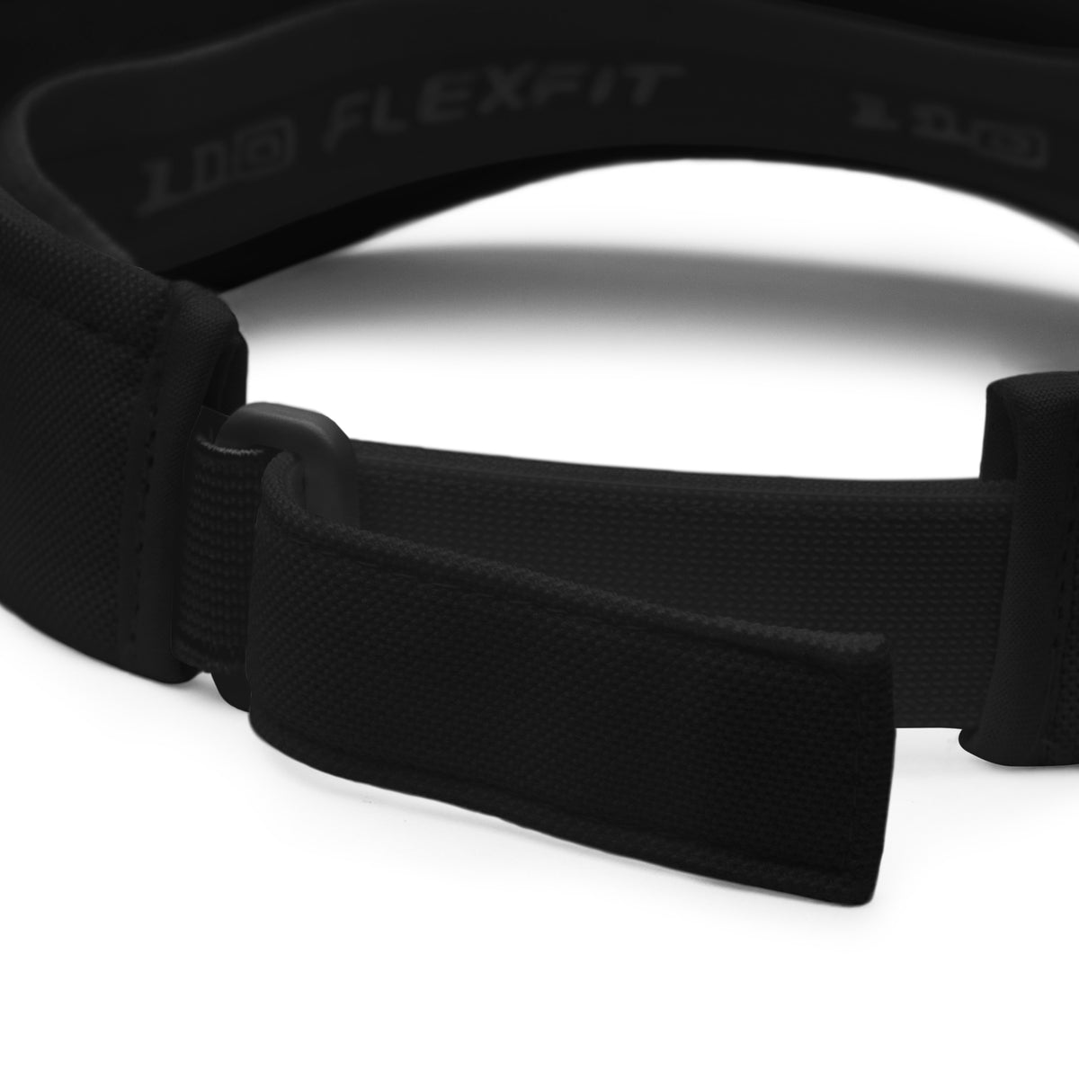 Black classic visor close-up showing inner elastic strap and textured fabric