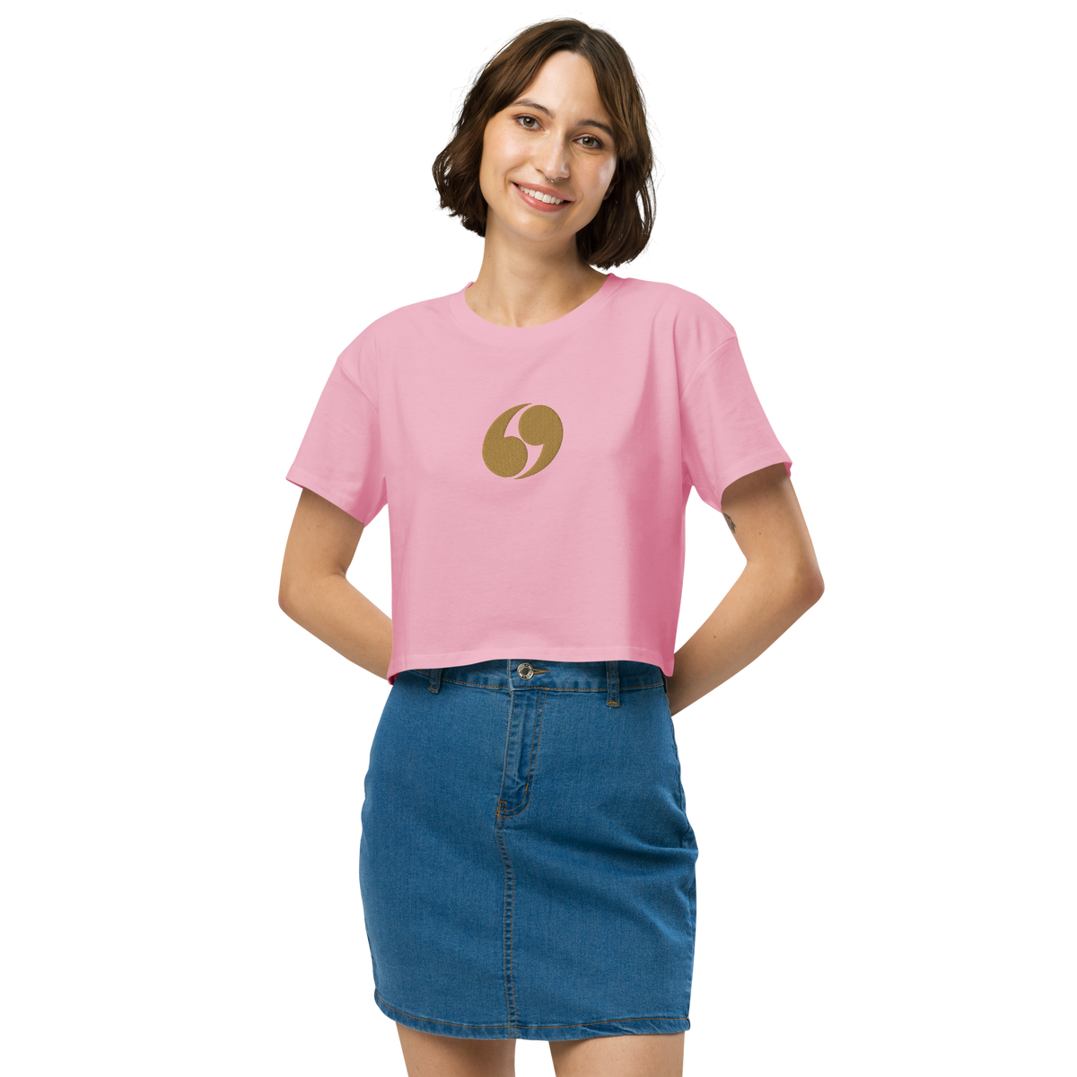Pink cropped T-shirt with crew neck and small gold logo at center chest