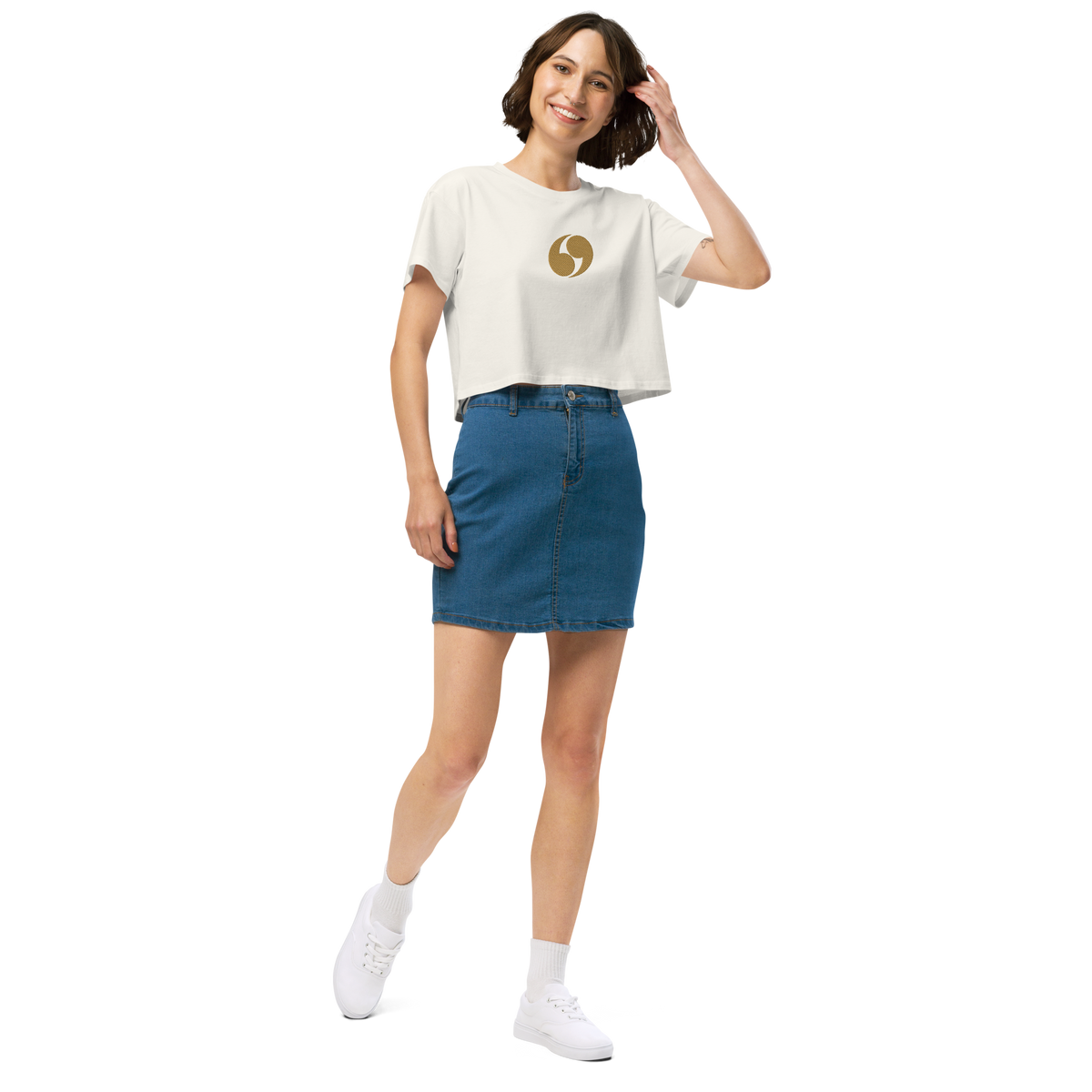 White cropped tee with short sleeves and small gold logo