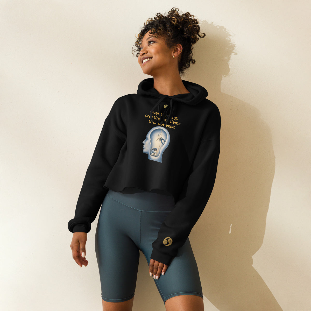 Cropped black hoodie with graphic on chest, hood, long sleeves, front pocket