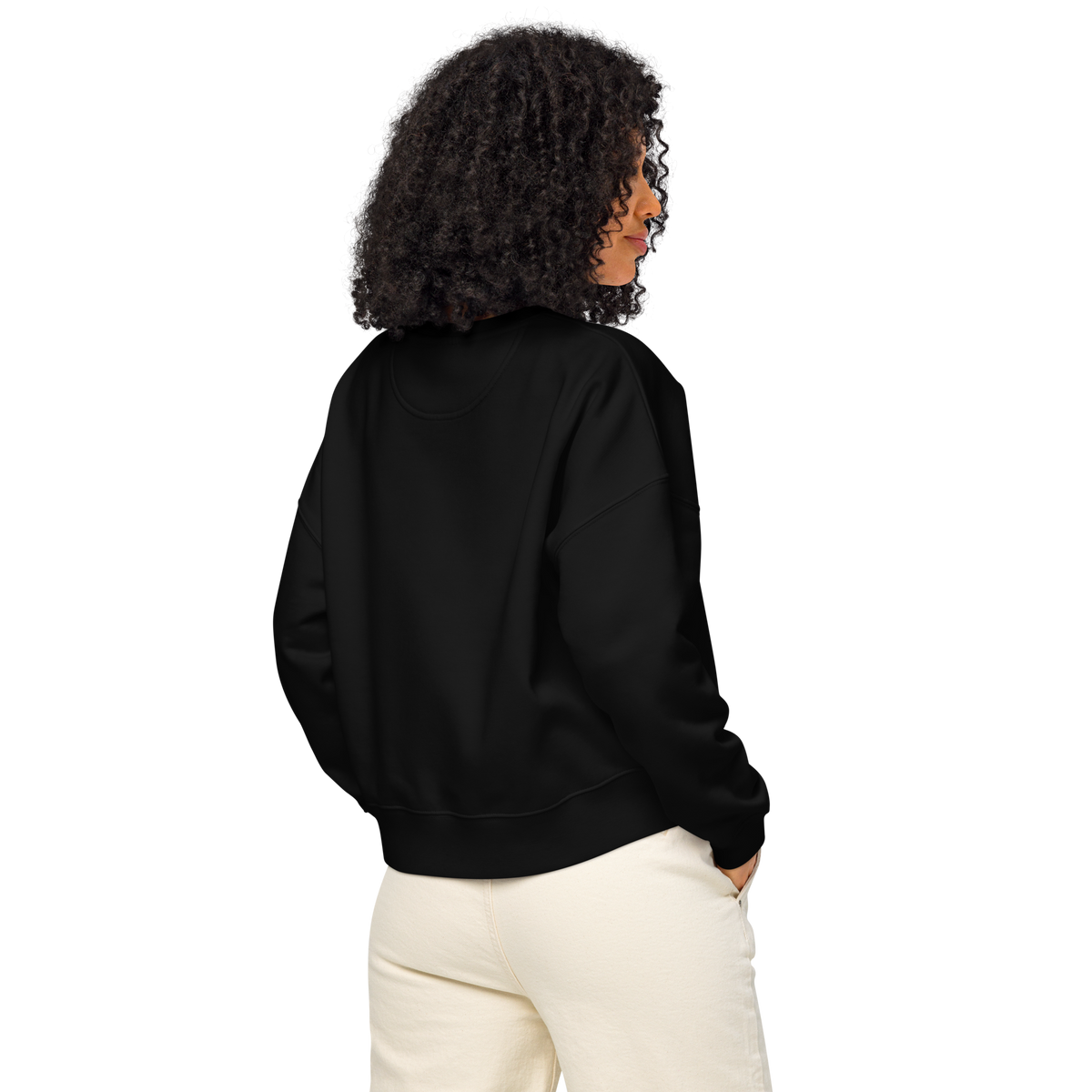 Black crew sweatshirt, long sleeves with ribbed crew neck, shown from back